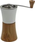 CERAMIC AND OLIVEWOOD - Dimensions¸ 86 x 185 mm - conical ceramic burrs - collection drawer capacity approx. 30 g - commercial coffee spare part